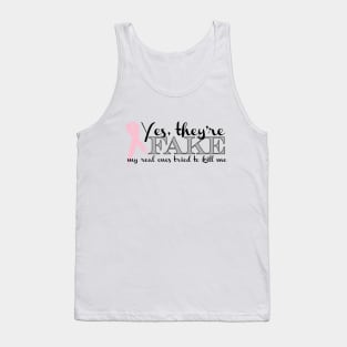 Yes, they're FAKE  My real ones tried to kill me Tank Top